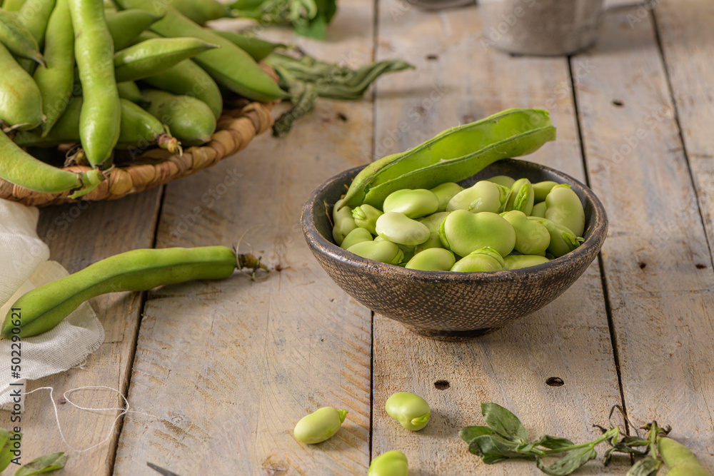 Fresh and raw green broad beans Fresh and raw green broad beans