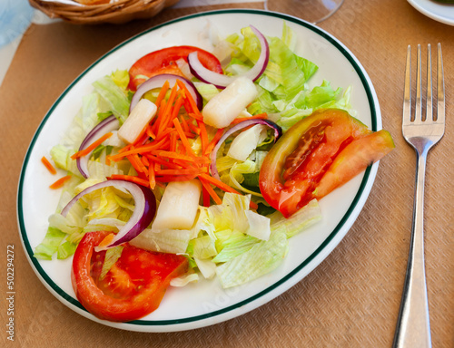 Close up of Spanish vegeterian salad on white plate