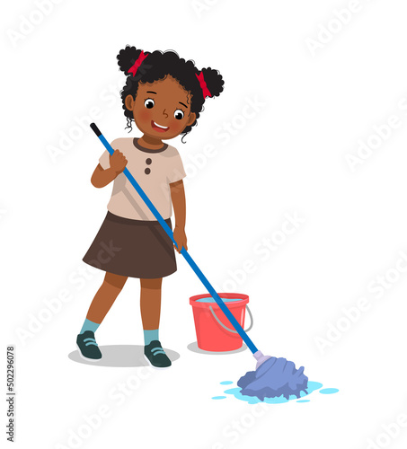 cute little African girl mopping the floor with mop and bucket doing housework chore at home