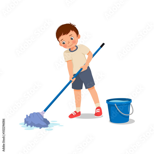 cute little boy mopping the floor with mop and bucket doing housework chore at home