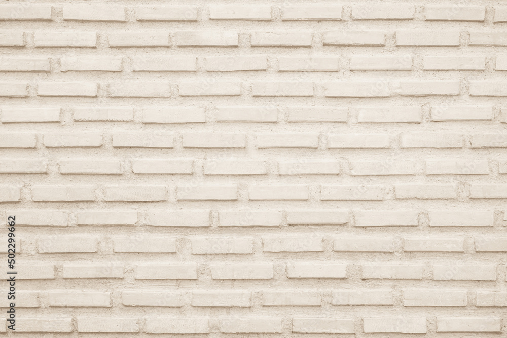 Obraz premium Cream brick wall background. Vintage texture of antique brickwork.