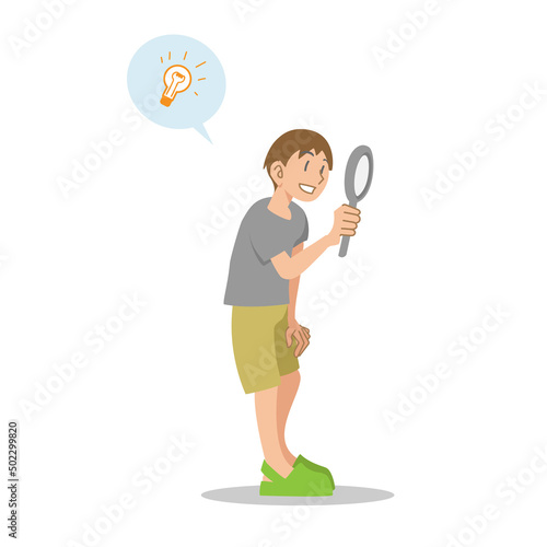 虫眼鏡を見る子供