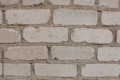 Grey brick wall texture background.