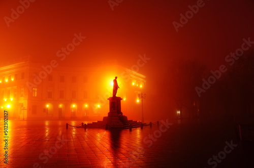 Night photo in heavy fog. Monument to Duke on the square. Odessa. Ukraine.