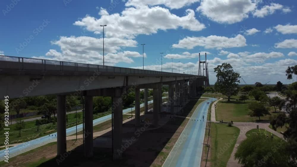 soaring drone flight shows the bridge and highway crossing the parana river in rosario, argentina soaring drone flight shows the bridge and highway crossing the parana river in rosario, argentina