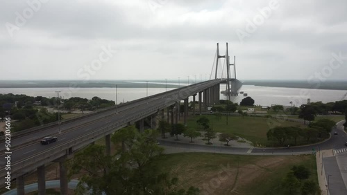 aerial scenic flight with a view of the roundabout and bridge of the parana river in rosario argentina photo