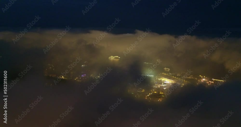 Aerial Shot Of Illuminated City On Mountains Seen From Dramatic Sky At Night - Monaco Aerial Shot Of Illuminated City On Mountains Seen From Dramatic Sky At Night - Monaco