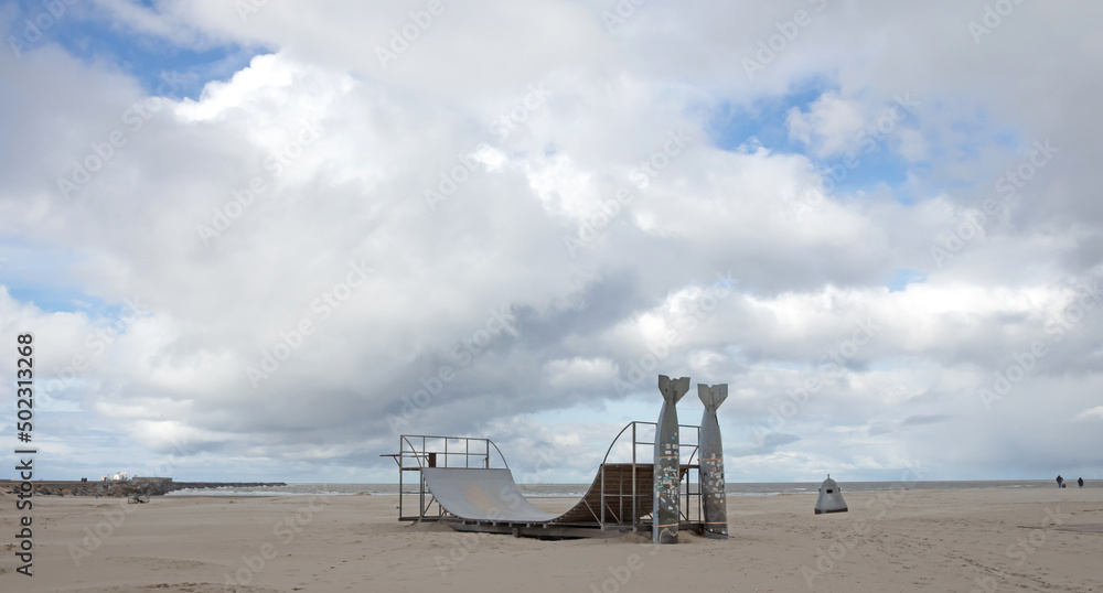 Skatebord halfpipe on a beach Skatebord halfpipe on a beach