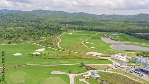 Drone flying over Vistas Golf and Country Club, Santo Domingo in Dominican Republic. Aerial forward photo