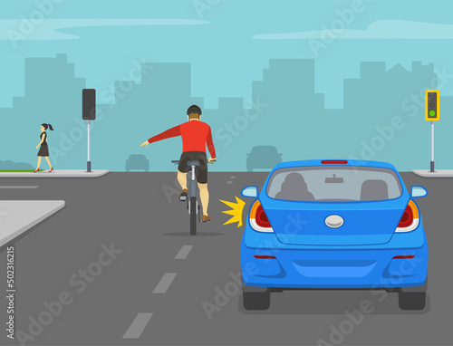 Traffic regulation on roads. Safe bicycle riding. Cyclist turning left on crossroad. Back view of a cyclist showing turning gesture while cycling. Left turning traffic flow. Flat vector illustration.
