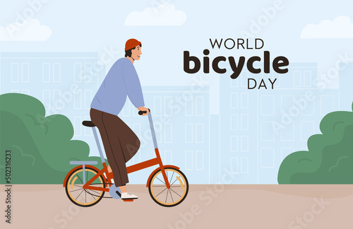 World Bicycle Day Banner. Man riding street folding bicycle in city vector flat illustration. Smiling male bicyclist dressed in stylish clothes riding bicycle. Happy young man on bike. 