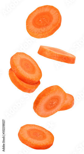 Fotografiet flying or falling pieces of carrots