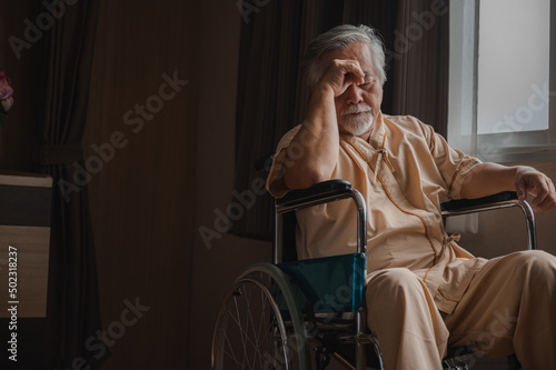 old Asian man person, senior elderly male patient have a depression disease and retirement, lonely and sad at hospital, medical mental health concept banner background with copy space photo