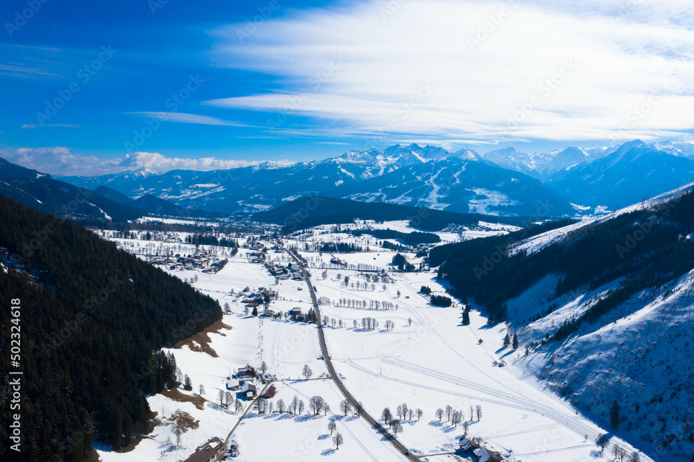 Panorama aerial view from the Dachstein Glacier. The plateau is the best place for skiing, snowboarding and other winter sports, Styria, Austria. Tourism and vacations concept.