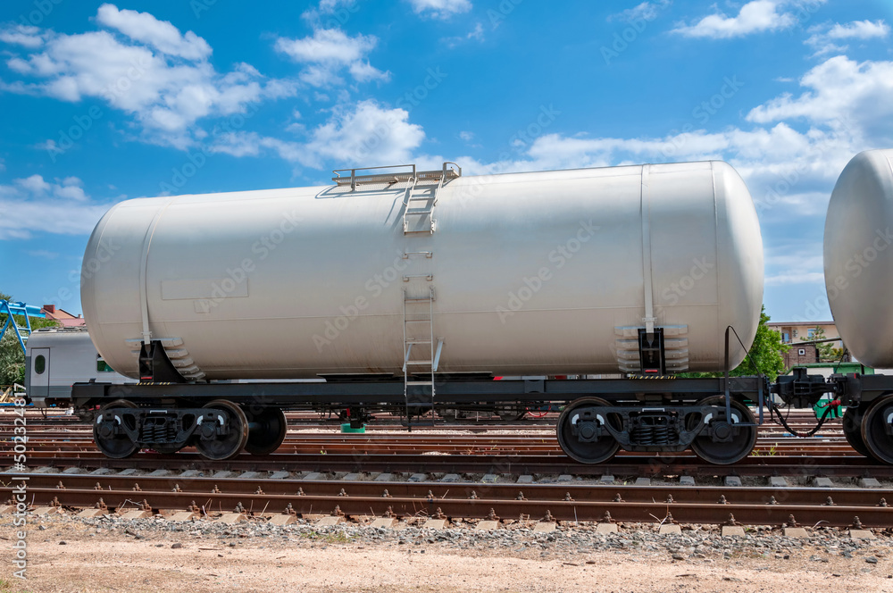 Naklejka premium Railway tank stands on the tracks at the station.