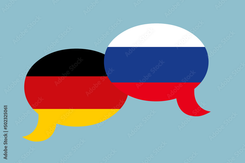 Zwei Sprechblasen in den Farben von Deutschland und Russland. Konzept Dialog zwischen den Ländern oder Menschen Zwei Sprechblasen in den Farben von Deutschland und Russland. Konzept Dialog zwischen den Ländern oder Menschen