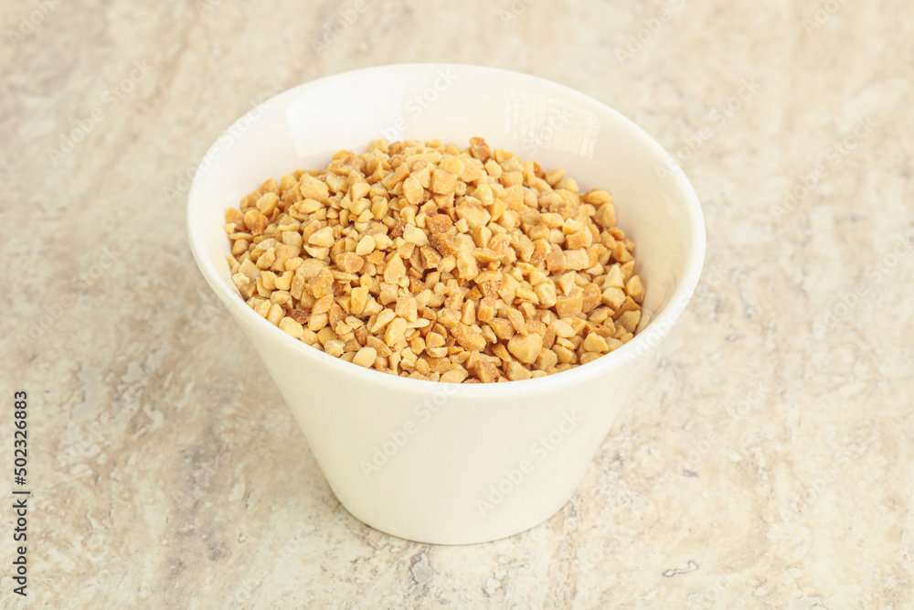 Crunched roasted peanut in the bowl Crunched roasted peanut in the bowl