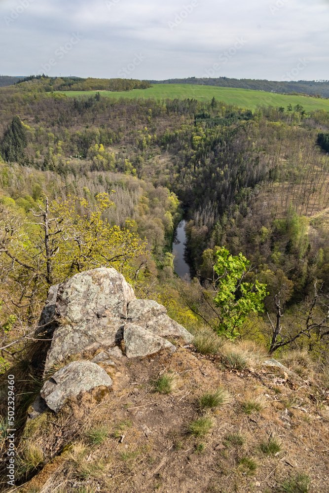 Rocky viewpoint under river valley in spring landscape Rocky viewpoint under river valley in spring landscape