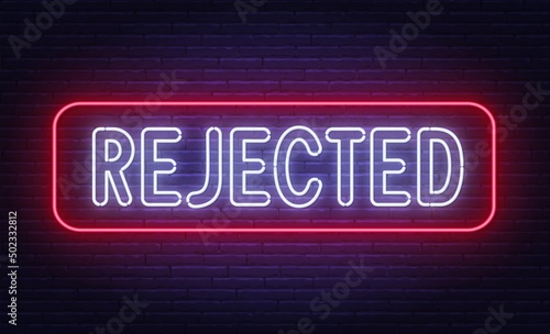 Neon sign Rejected on brick wall background.