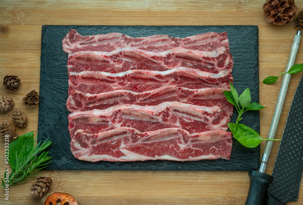 Beef Rib Slice Beef Short Ribs (Sliced) Bone-in on wooden background.Cross Cut Short ...
