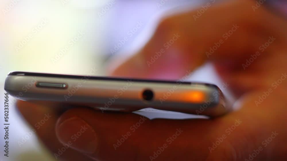 Operating, sliding, texting with cell phone. Operating, sliding, texting with cell phone.