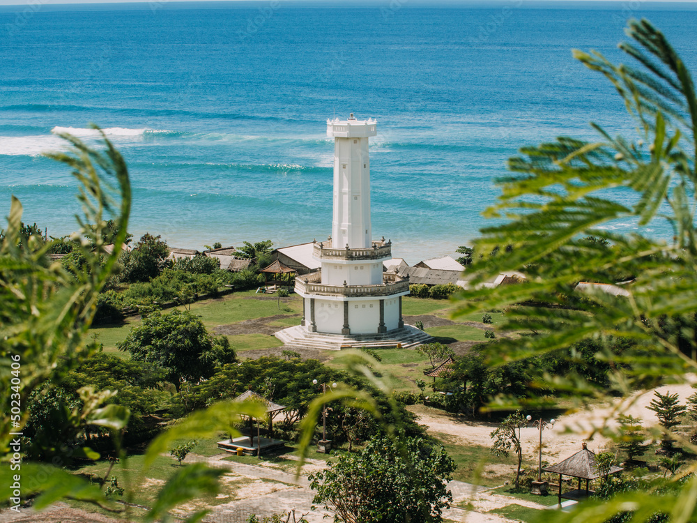 A lighthouse on the beach in Bali