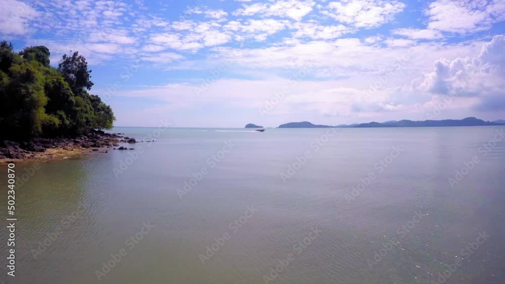 Aerial Shot Of Speedboat Moving In Sea Under Cloudy Sky, Drone Flying Forward On Sunny Day - Bangkok, Thailand Aerial Shot Of Speedboat Moving In Sea Under Cloudy Sky, Drone Flying Forward On Sunny Day - Bangkok, Thailand