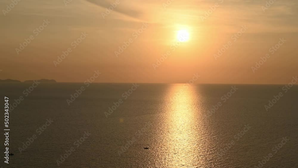 Beautiful romantic colorful sunset at the sea. Sun go down with orange clouds flow in sky. Majestic summer landscape. Exploring beauty world, travel, holidays, recreation time lapse footage.
Beautiful romantic colorful sunset at the sea. Sun go down with orange clouds flow in sky. Majestic summer landscape. Exploring beauty world, travel, holidays, recreation time lapse footage.