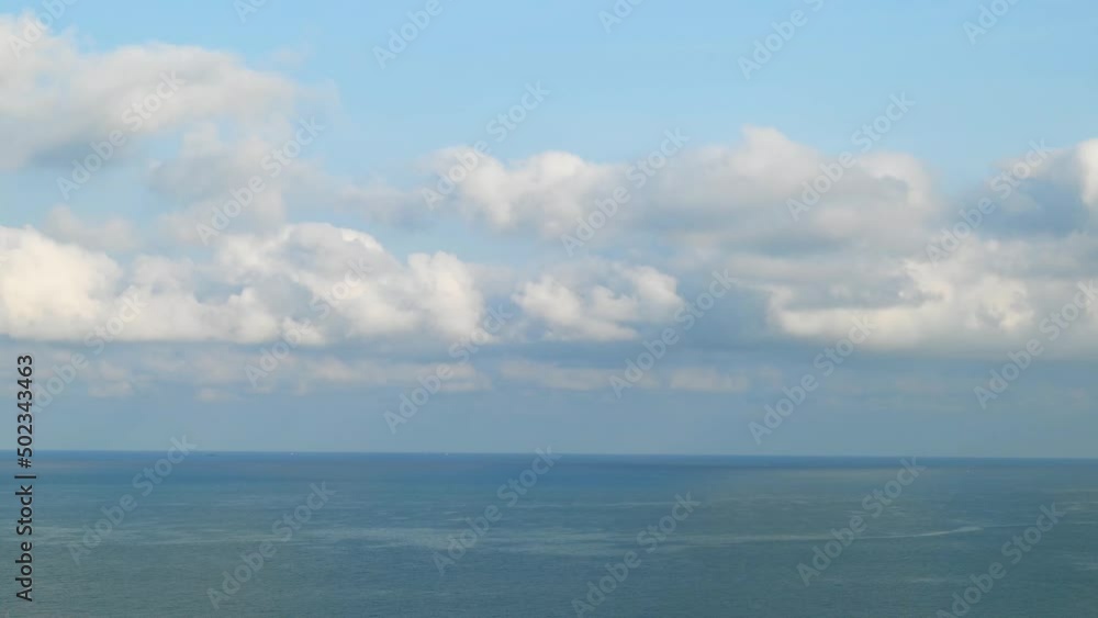 Blue ocean white nature tropical Island. Sea and sky. Wild beach. landscape Island. Turquoise sea background sea wave ocean with clear sky and clouds. Blue ocean white nature tropical Island. Sea and sky. Wild beach. landscape Island. Turquoise sea background sea wave ocean with clear sky and clouds.