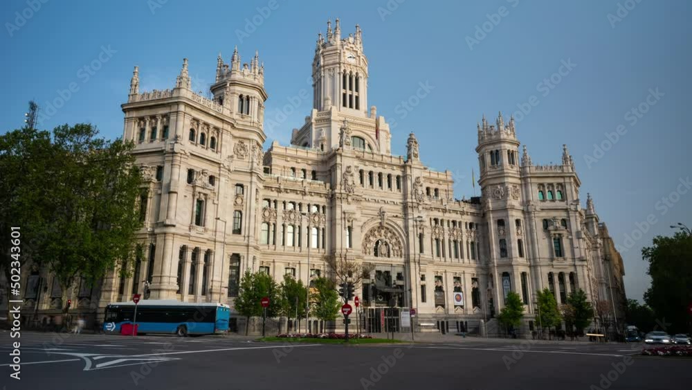 Cibeles building and cars traffic at Plaza de Cibeles in Madrid on a beautiful spring day, Spain timelapse Cibeles building and cars traffic at Plaza de Cibeles in Madrid on a beautiful spring day, Spain timelapse