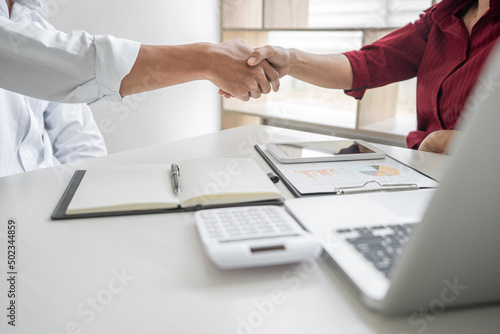 Meeting and greeting concept, Business casual handshake and business people after discussing good deal of Trading contract and new projects for both companies, success, partnership, co worker