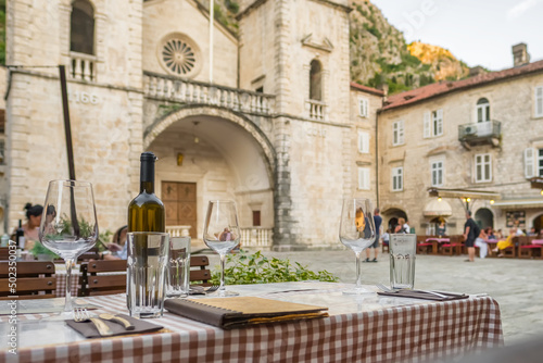 Outdoor street cafe in Kotor old town square in Montenegro
