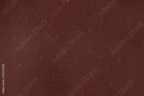 Blurred red flooring background, linoleum texture, abstract design. photo
