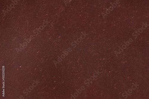 Blurred red flooring background, linoleum texture, abstract design.