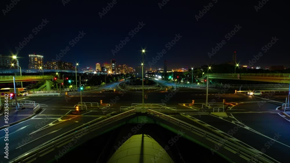 A night timelapse of the traffic jam at the urban street in Tokyo wide shot A night timelapse of the traffic jam at the urban street in Tokyo wide shot