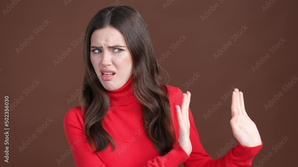 Frustrated lady deny empty space stench isolated brown color background Frustrated lady deny empty space stench isolated brown color background