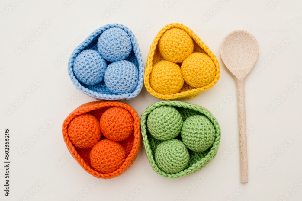 Crochet safe toys gift idea for babies. Easter colored ball sorting game for Kids. preschool education. coordination of movements, fine motoric skills