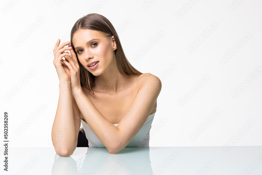 Beautiful and smiling woman with clean skin, white background with place for inscription. Freshness, health and beauty. Beautiful and smiling woman with clean skin, white background with place for inscription. Freshness, health and beauty.