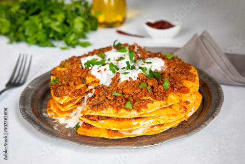 Turkish Food Kayseri Yaglama with Minced Meat, Yogurt and Tomato Paste photo