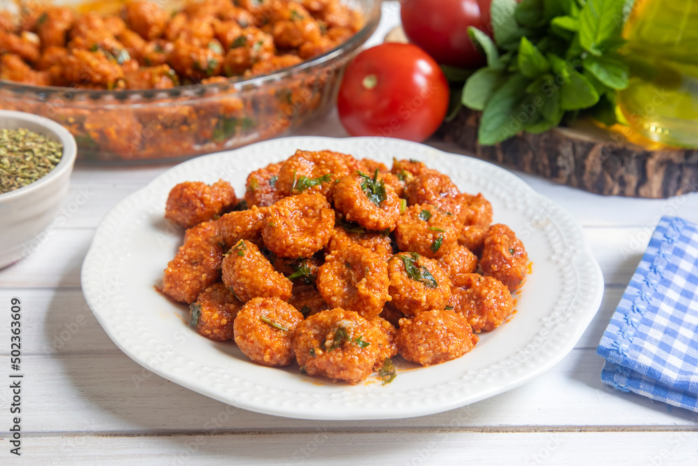 Traditional delicious Turkish food; bulgur garlic meatball (Turkish name; Sarimsakli bulgur kofte or Fellah koftesi) Traditional delicious Turkish food; bulgur garlic meatball (Turkish name; Sarimsakli bulgur kofte or Fellah koftesi)