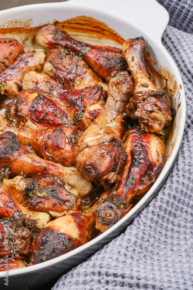Hot homemade chicken with balsamic vinegar sauce in a baking dish. Shallow depth of field Hot homemade chicken with balsamic vinegar sauce in a baking dish. Shallow depth of field