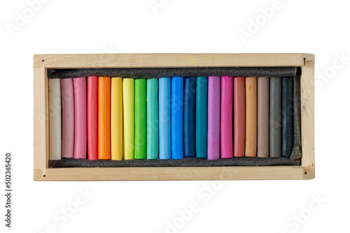 Pastel crayons in a wooden box photo