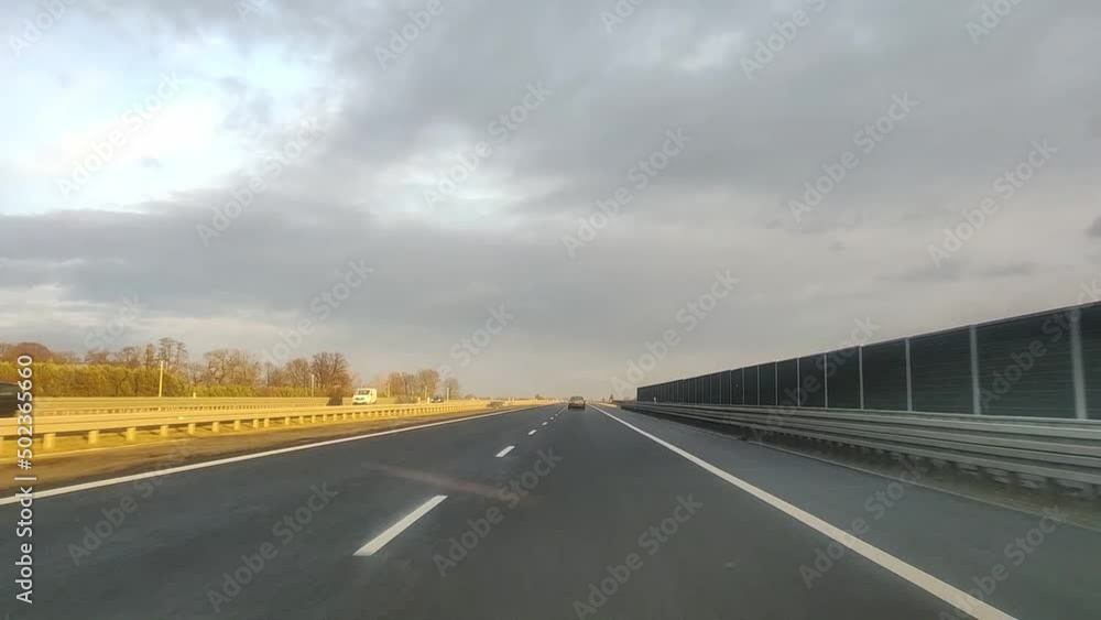 POV car driving on a motorway on a sunny summer day. Polish highway POV car driving on a motorway on a sunny summer day. Polish highway