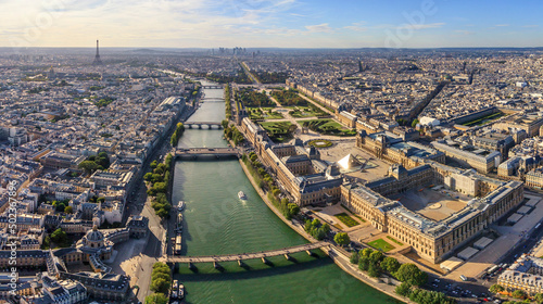 Panoramic aerial view of Le Louvre Museum along the Seine river in Paris downtown, France. photo