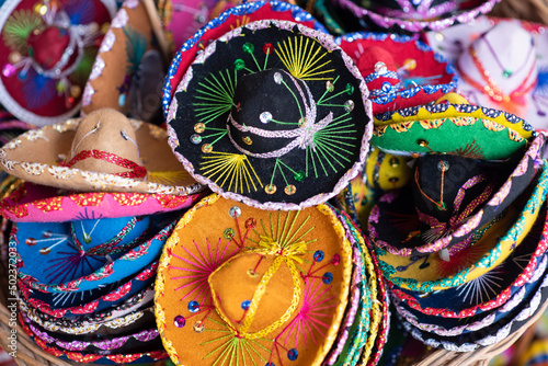Close-up of small colorful sombreros for sale as souvenirs in Mexico