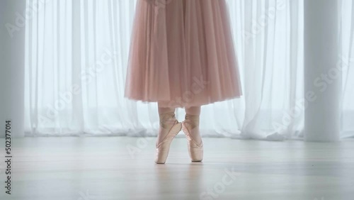 The legs of a dancing ballerina.