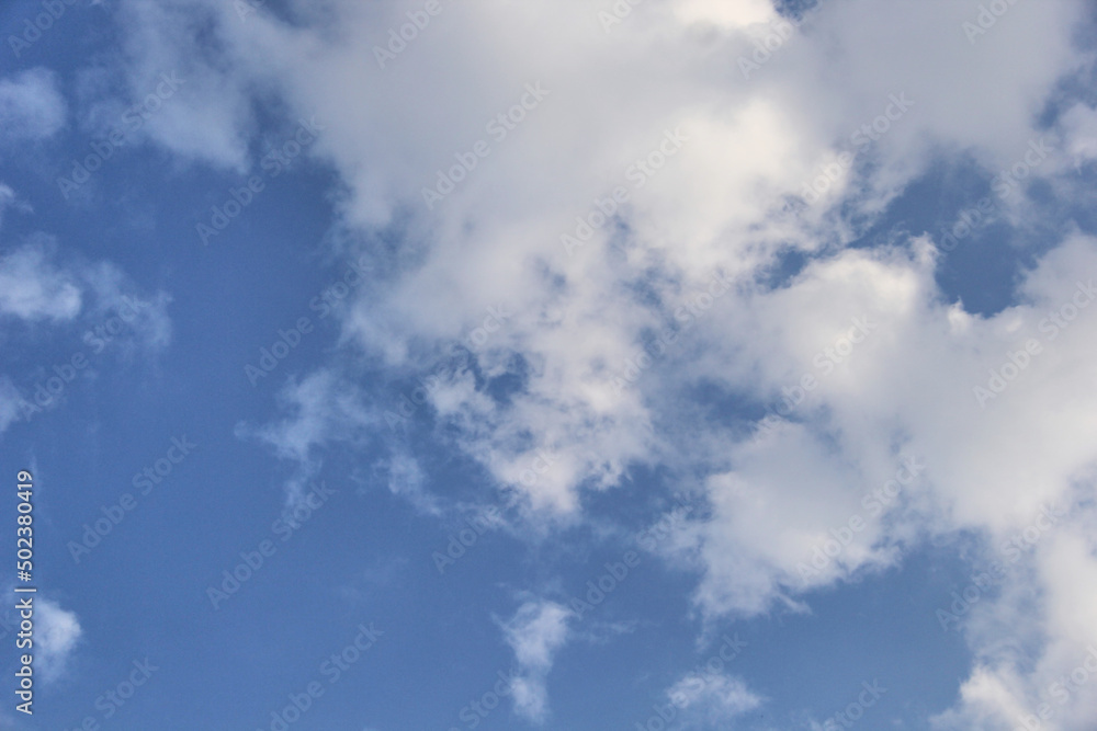Blue sky and white clouds. Beautiful sky background.