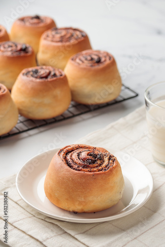 Round buns with poppy seeds