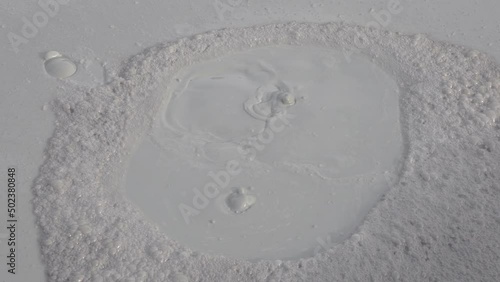 Seething crater of a mud volcano
