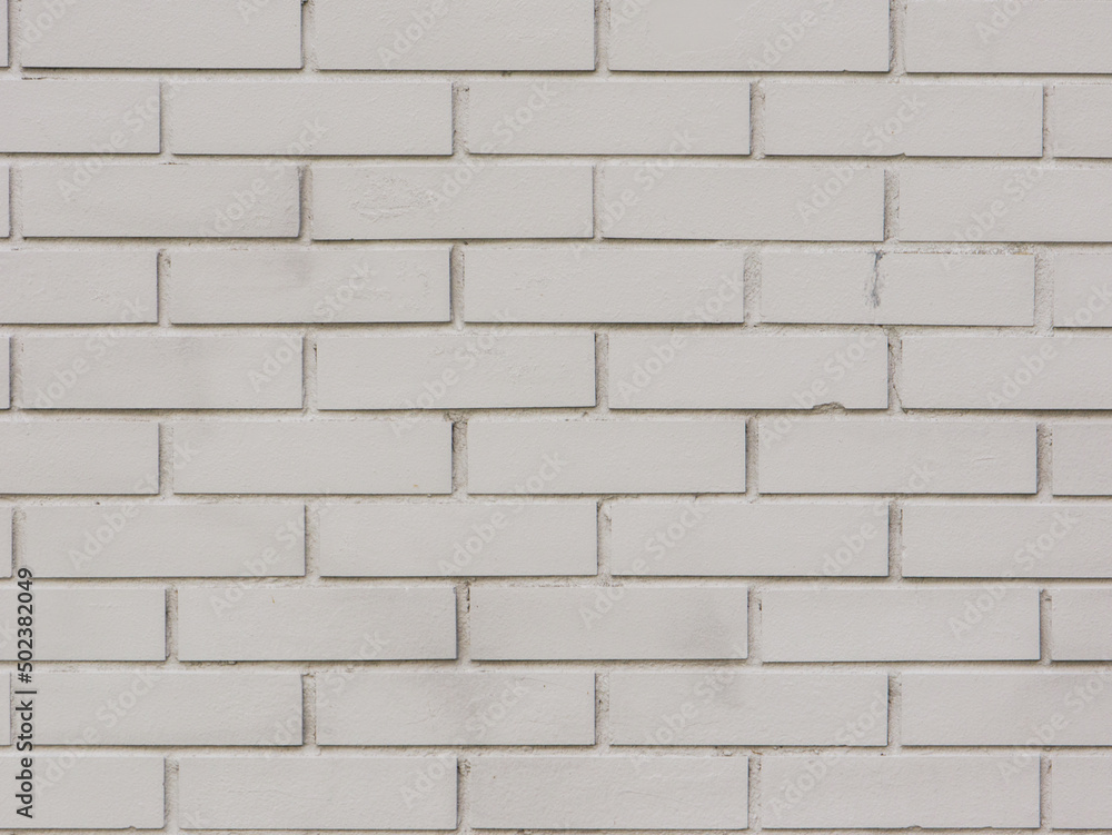 Naklejka premium Close-up shot of a grey brick wall.